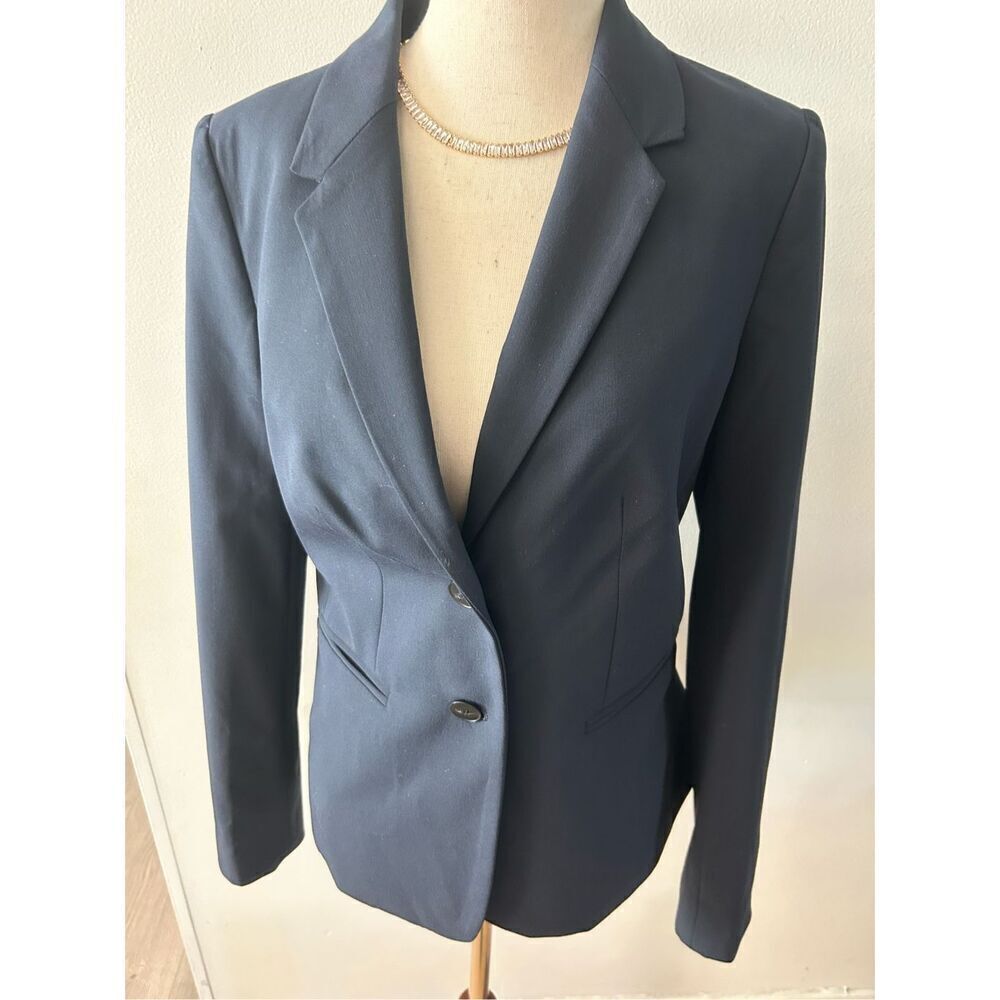 The limited blue blazer size 4